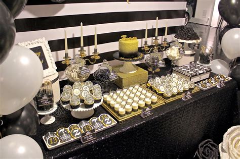 black and gold dessert table|More.